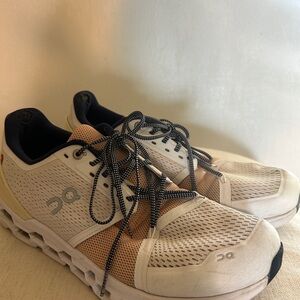 On Running White and Tan Running Shoes